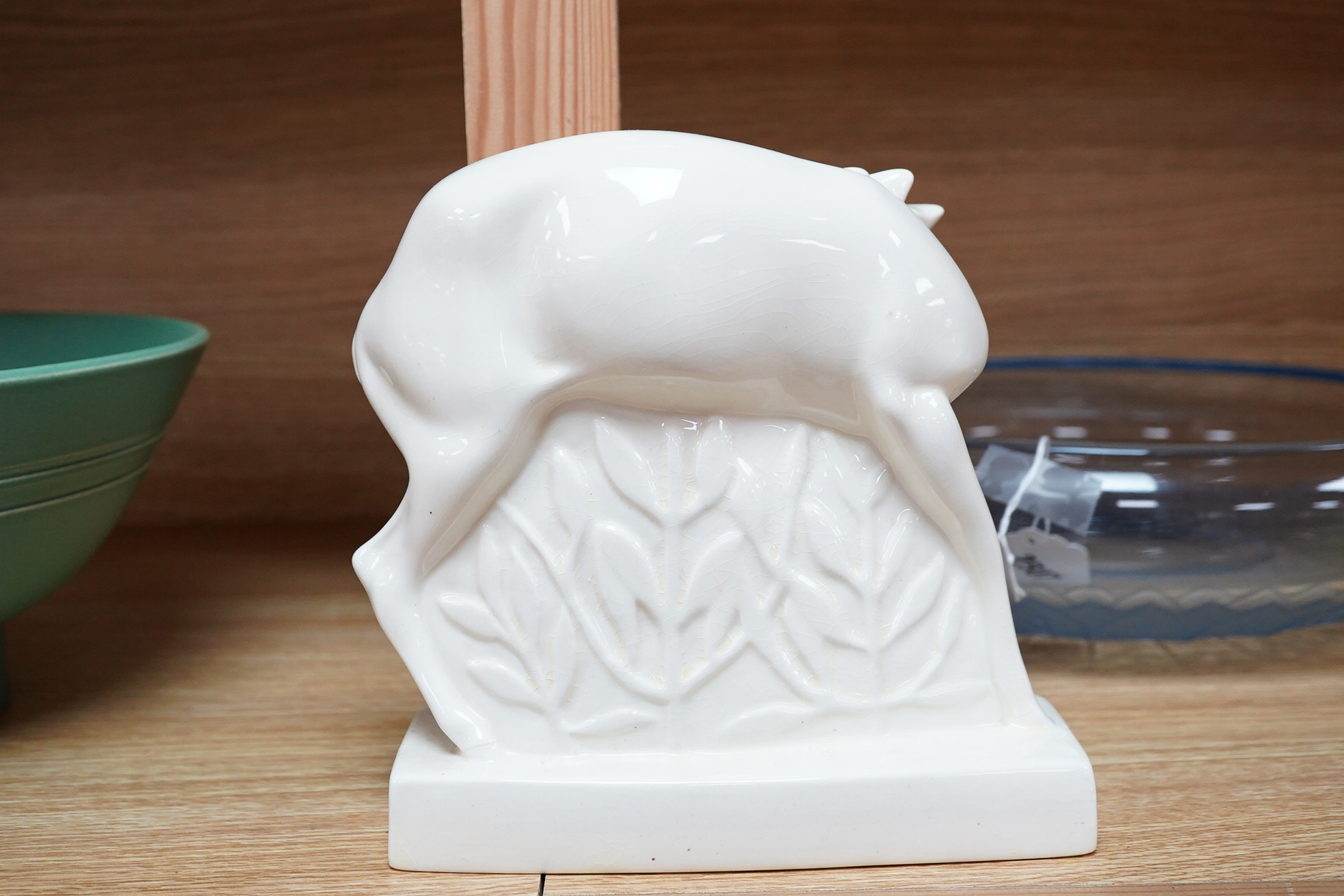 John Skeaping for Wedgwood, an Art deco Fallow deer, cream glazed, 20cm high
